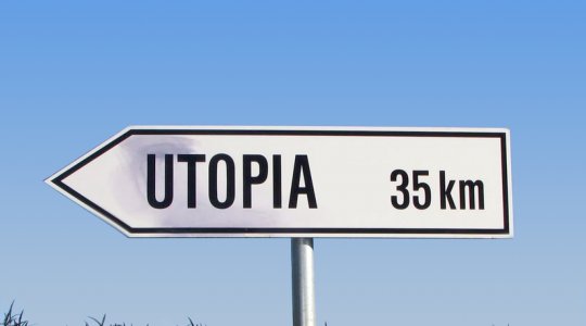 En vägskylt med texten Utopia